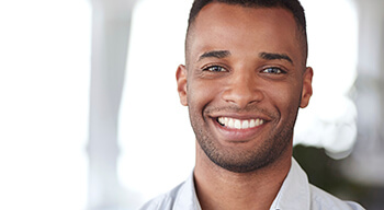 man in suit smiling