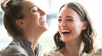 two women laughing